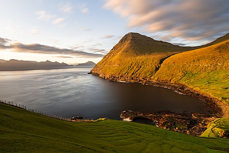 Bay of Gjogv in the island of Eysturoy, Faeroe islands, Denmark, Europe Bay of Gjogv in the island of Eysturoy, Faeroe islands, Denmark, Europe